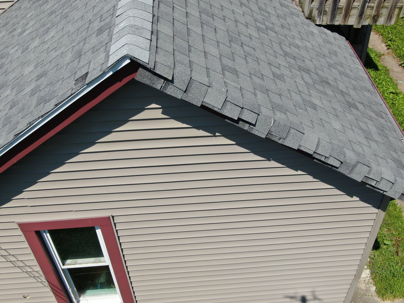 Improper roof shingle installation observed during a home inspection by Dairyland Home Inspection in Racine, Wisconsin.