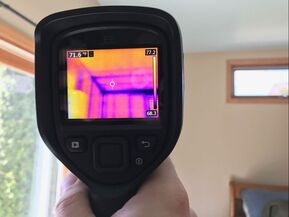Flir E6 thermal image camera during home inspection