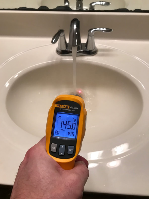 Hot water at a sink faucet of 145 degrees which is dangerous and observed by Dairyland Home Inspection.