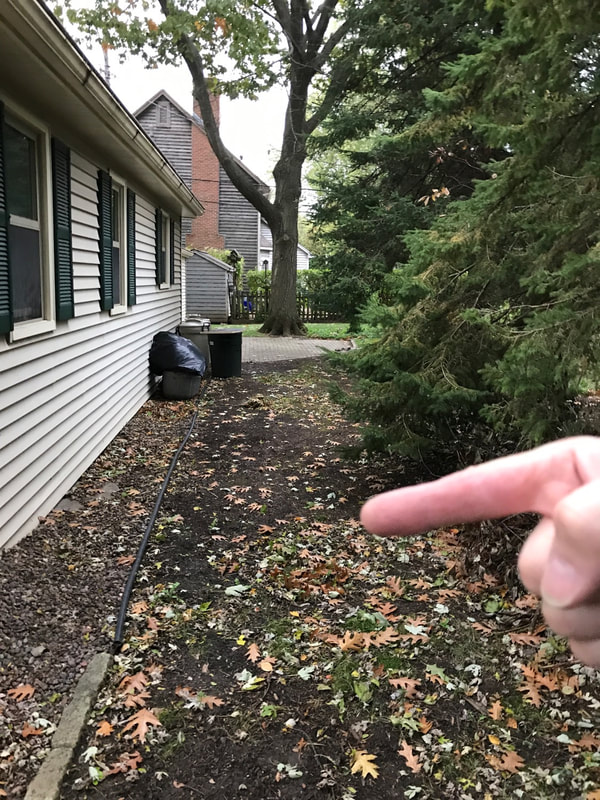 Negative grading observed by Dairyland Home Inspection during a home inspection in Racine, Wisconsin.