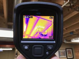 Thermal imaging camera inspecting a basement area.